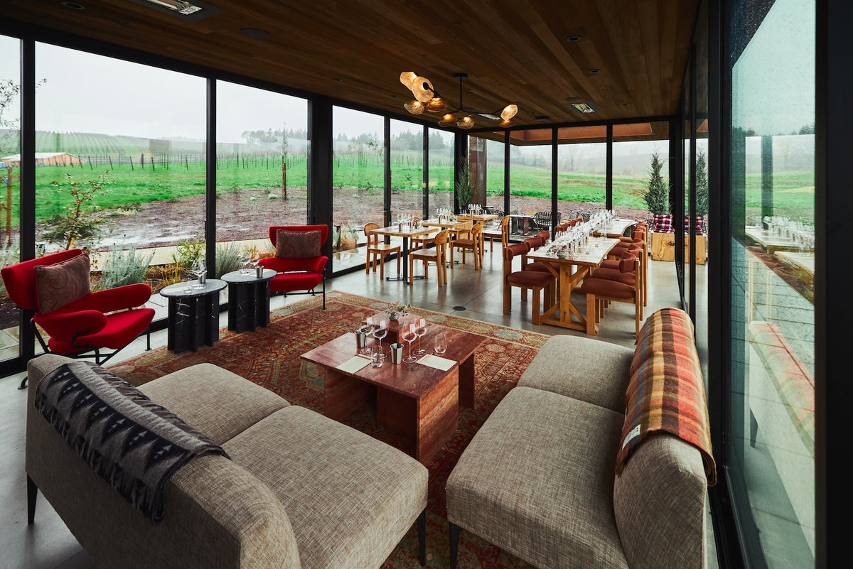 LF tasting room with large windows overlooking a scenic landscape