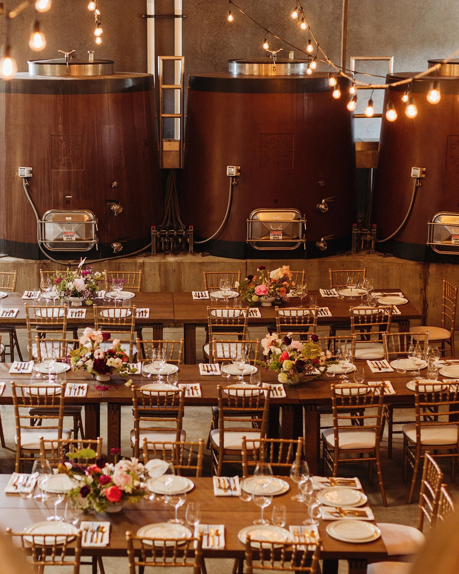 A view of the Lingua Franca dinner space next to our concrete fermenters